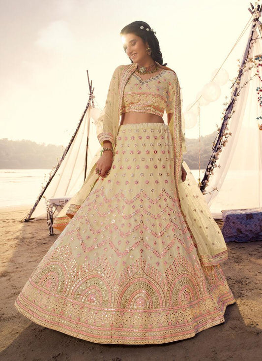 Soulful Pastel Yellow Foil Mirror Work Organza Lehenga Choli Set