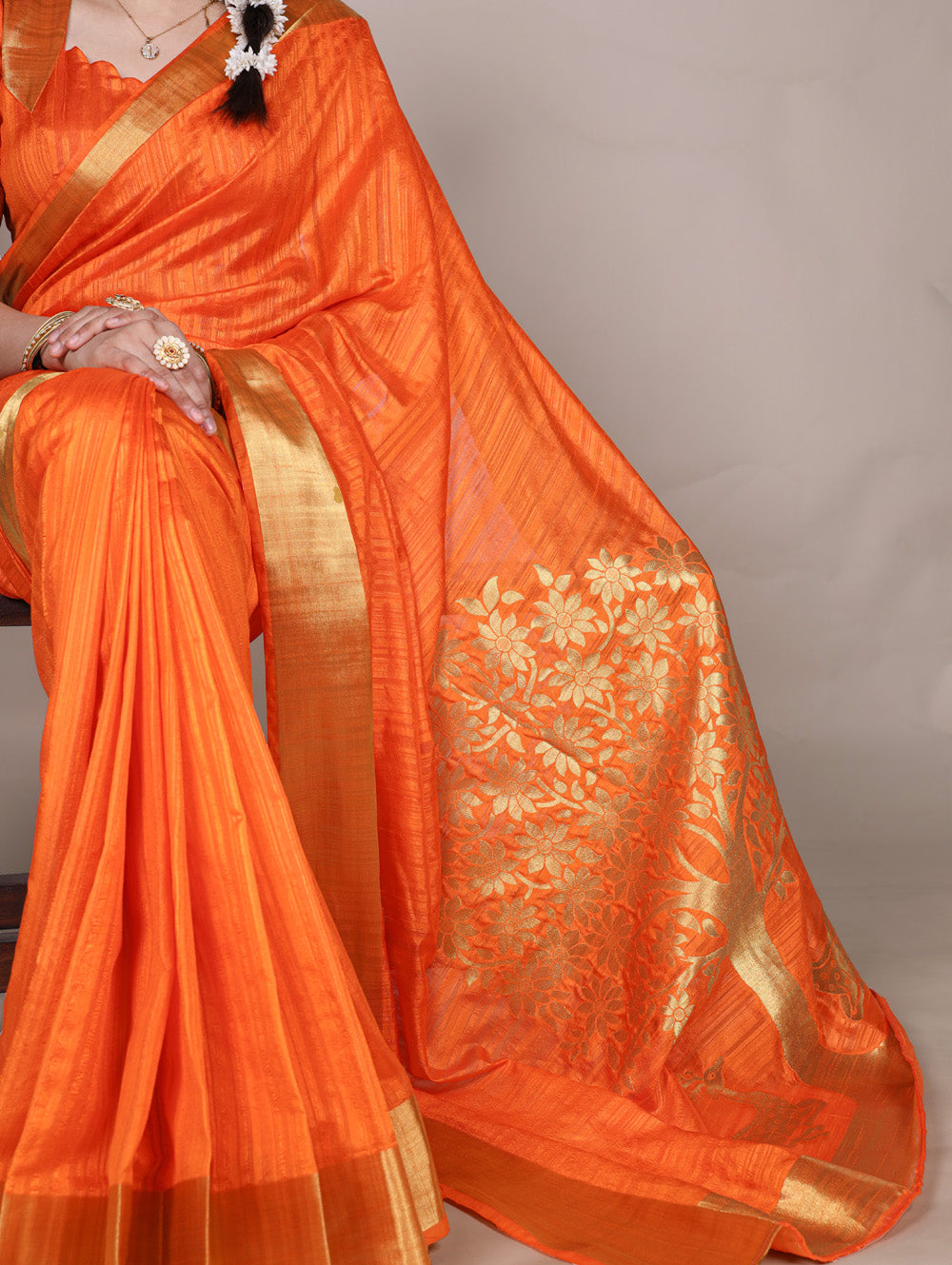 Orange raw silk saree with intricate zari weaving unstitched blouse