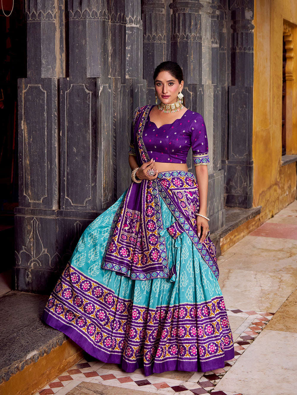 Sky blue tasar silk ikat patola print lehenga choli with purple embroidered blouse dupatta