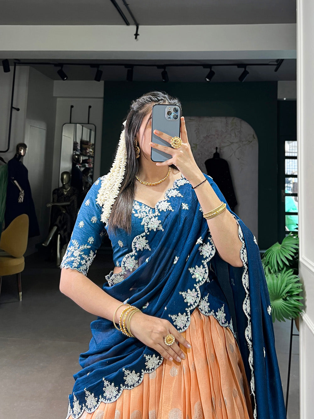 Orange zari kota embroidered lehenga choli with blue vichitra silk dupatta