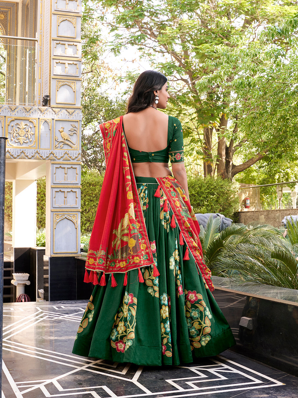 Emerald green tussar silk lehenga choli with foil print lace accents matching dupatta