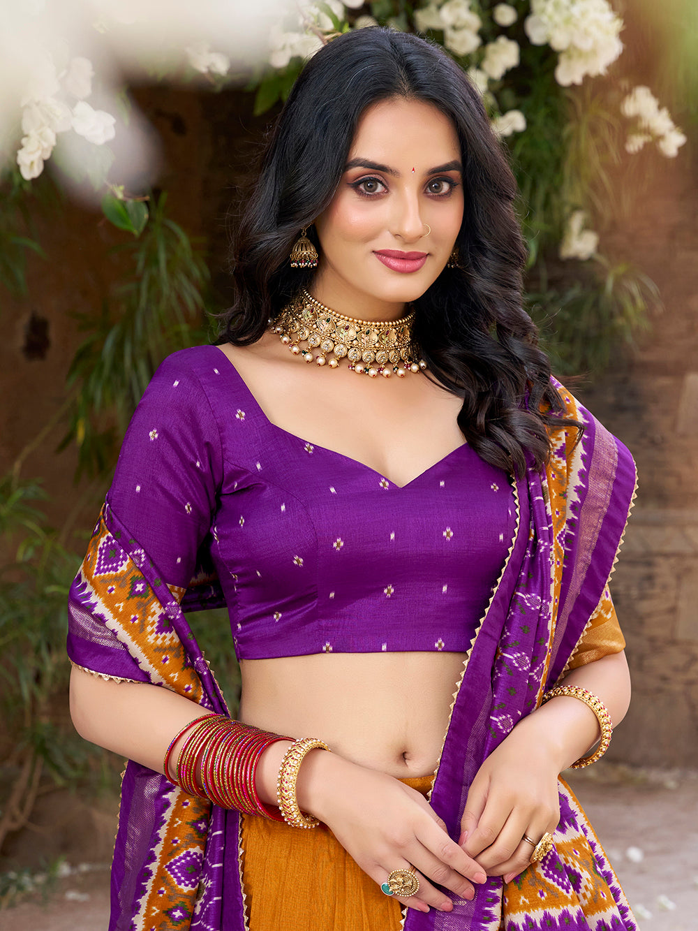 Mustard tasar silk lehenga choli with patola print foil work elegance