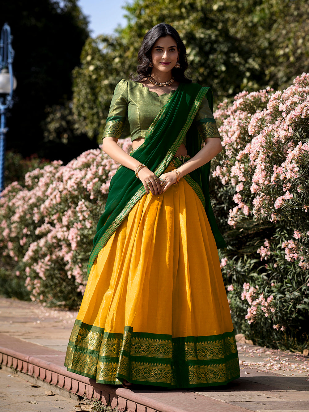 Yellow kanchipuram silk lehenga choli with zari weaving matching dupatta