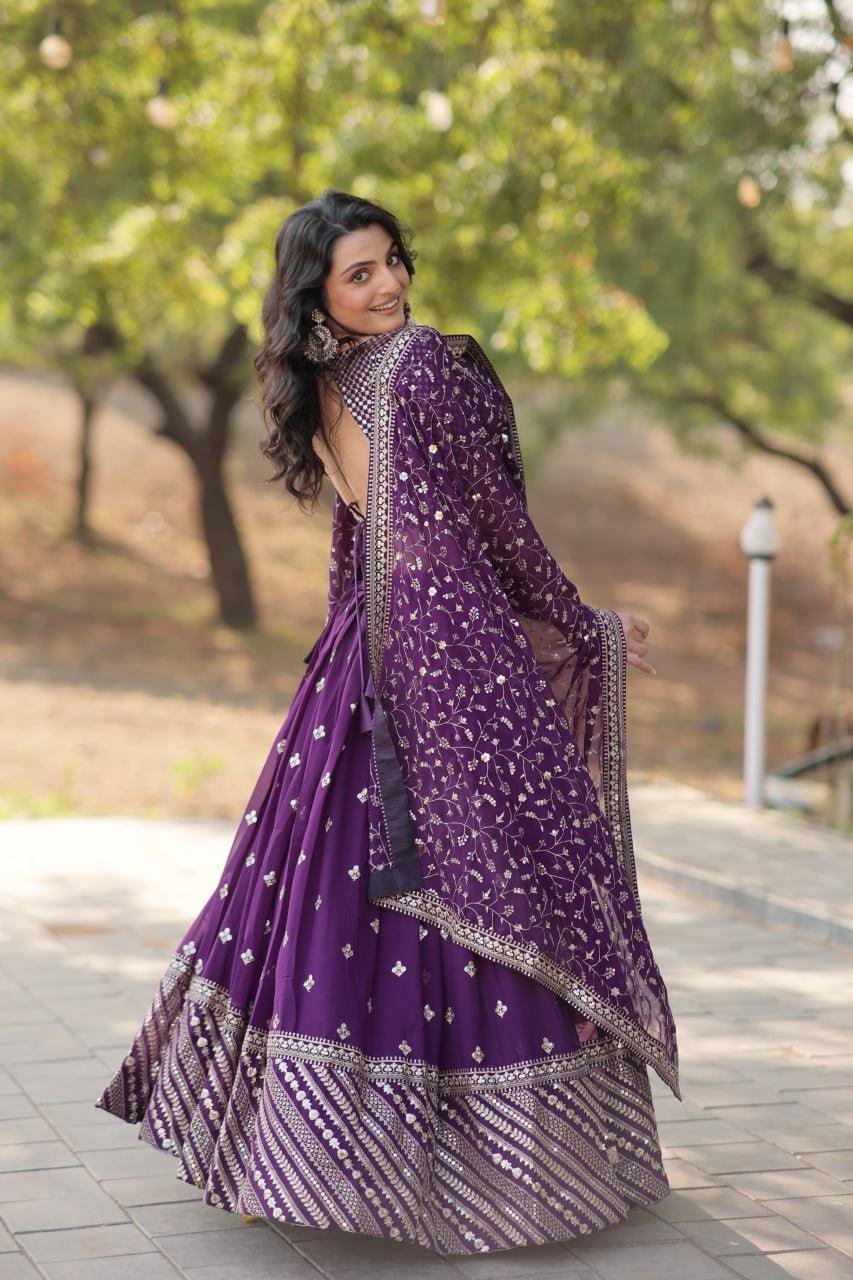 Spectacular Purple Faux Georgette Sequins Thread Embroidered Lehenga Set