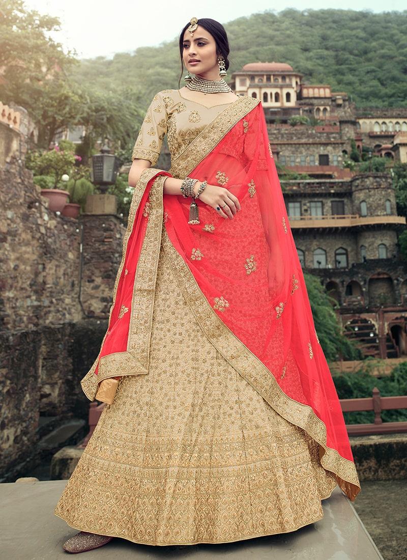 Stone Work Beige Color Satin Fabric Lehenga With Net Dupatta