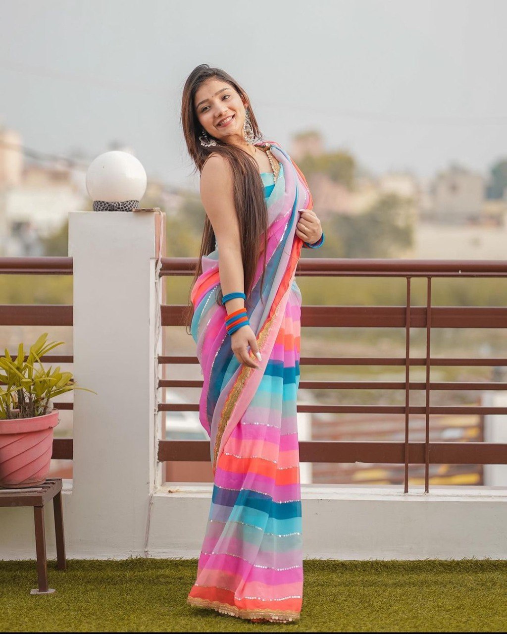Stunning Multicolor Faux Georgette Partywear Sequence Saree with Designer Blouse