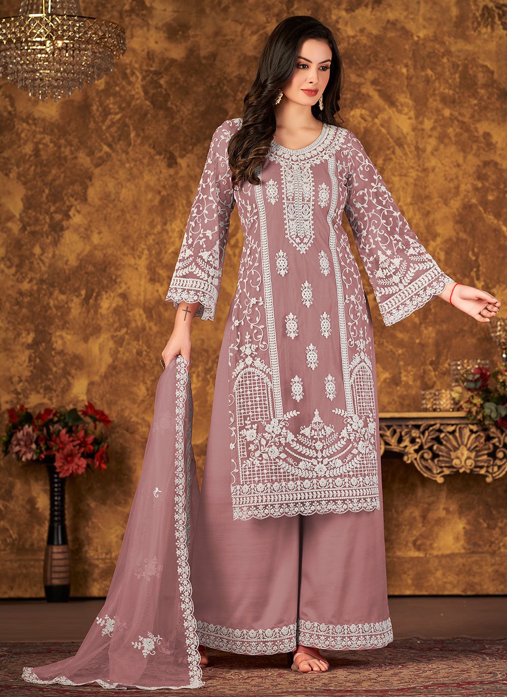 Stunning net embroidered reception wear palazo suit