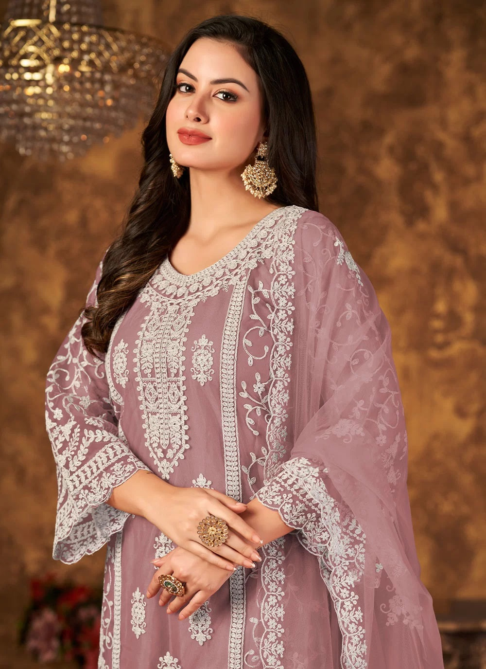 Stunning net embroidered reception wear palazo suit