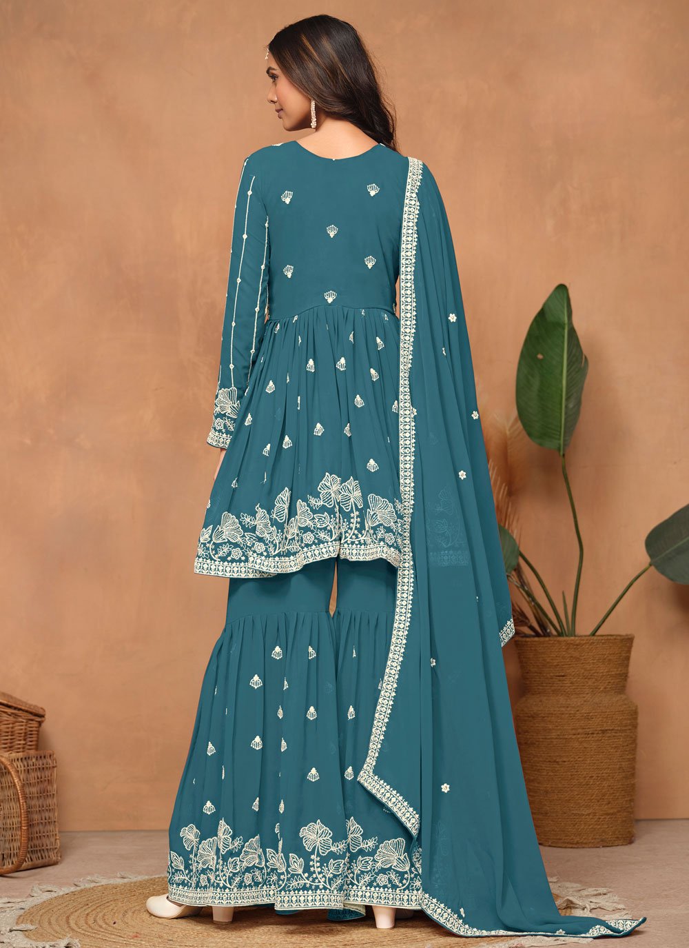 Stunning teal faux georgette embroidered sharara style suit