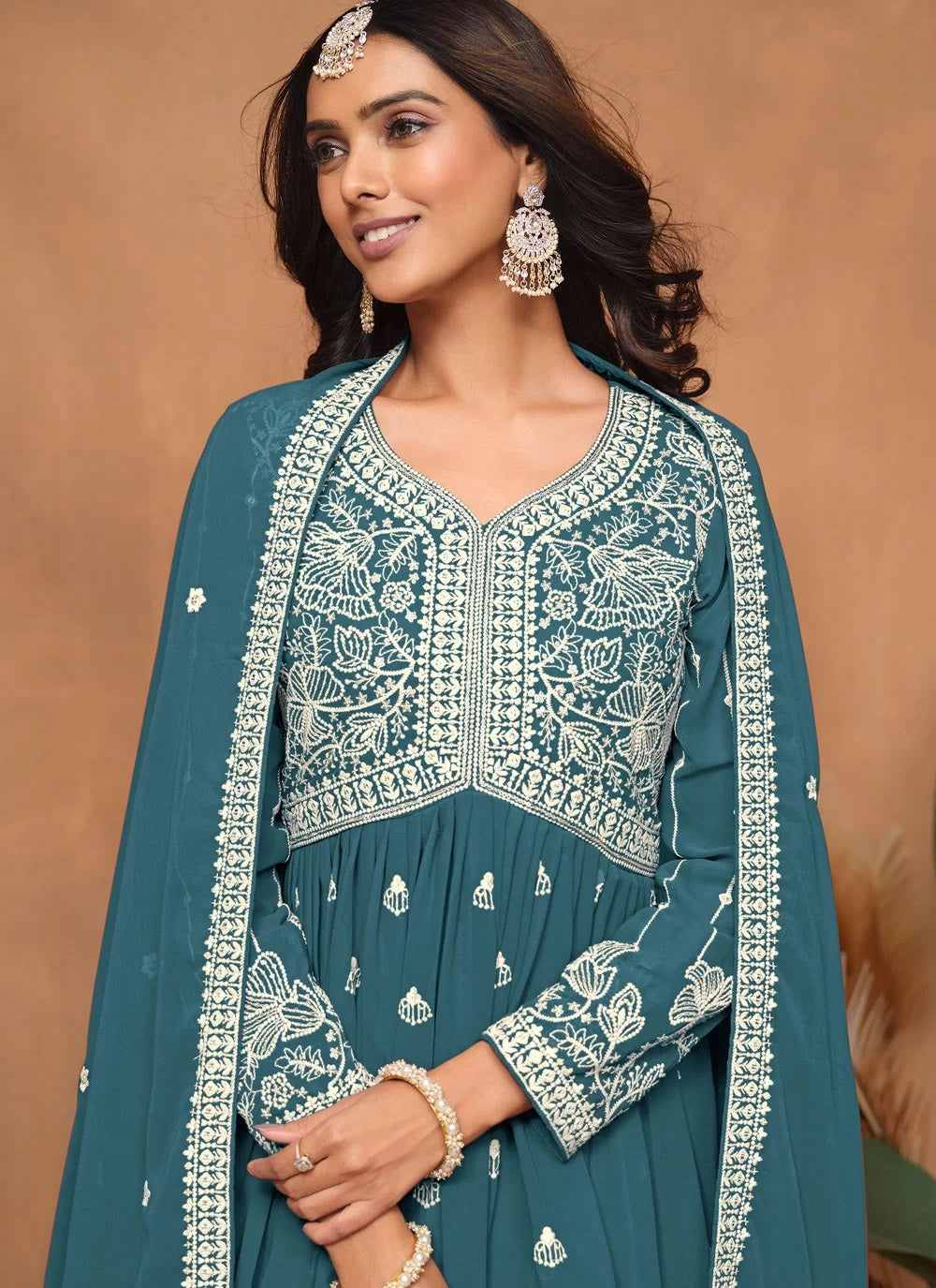 Stunning teal faux georgette embroidered sharara style suit