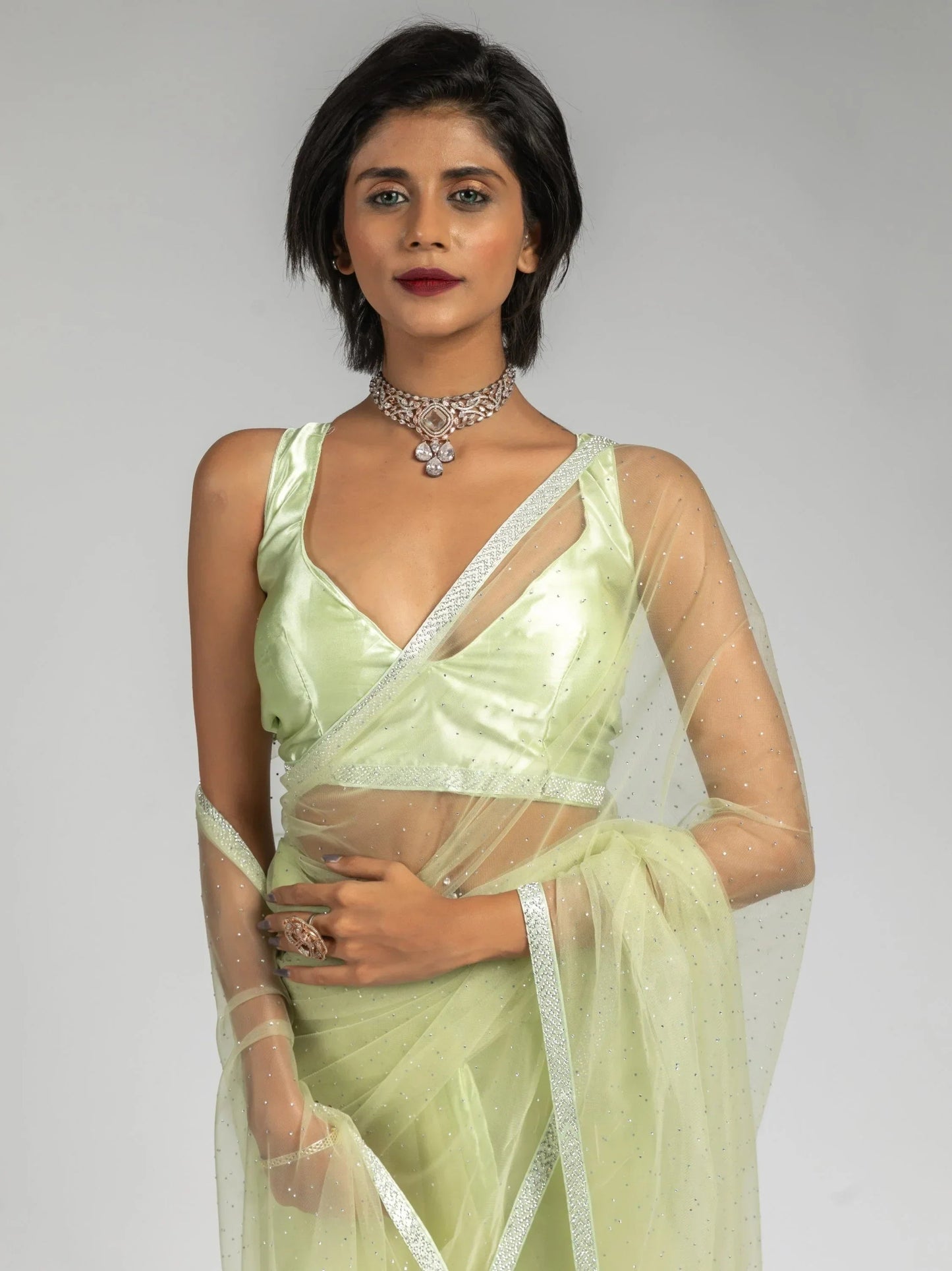 Tantalizing Pista Green Diamond Bordered Net Party Wear Pre-Stitched Saree