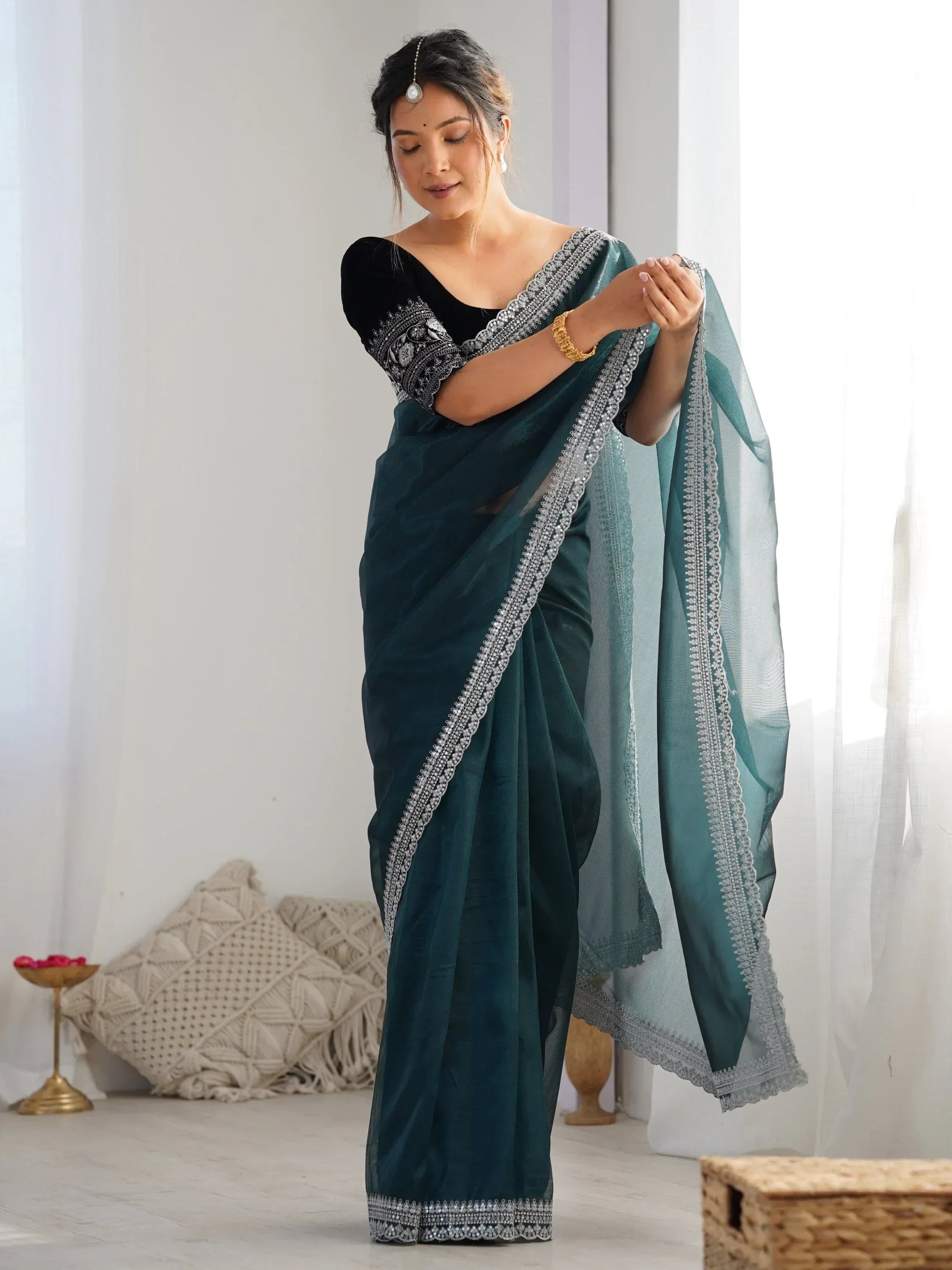 Tantalizing Teal Green Border Work Net Event Wear Saree With Blouse