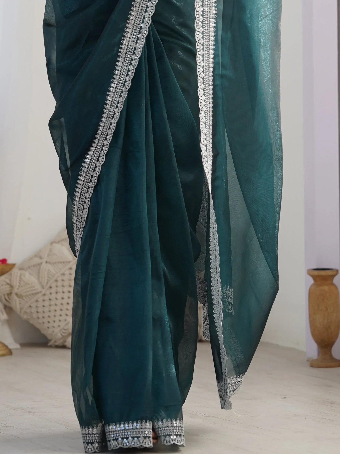 Tantalizing Teal Green Border Work Net Event Wear Saree With Blouse