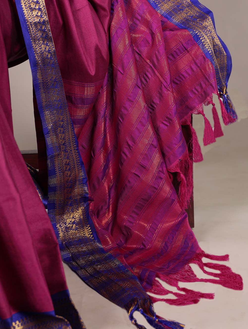 Pink aura silk saree with zari weaving and blue blouse