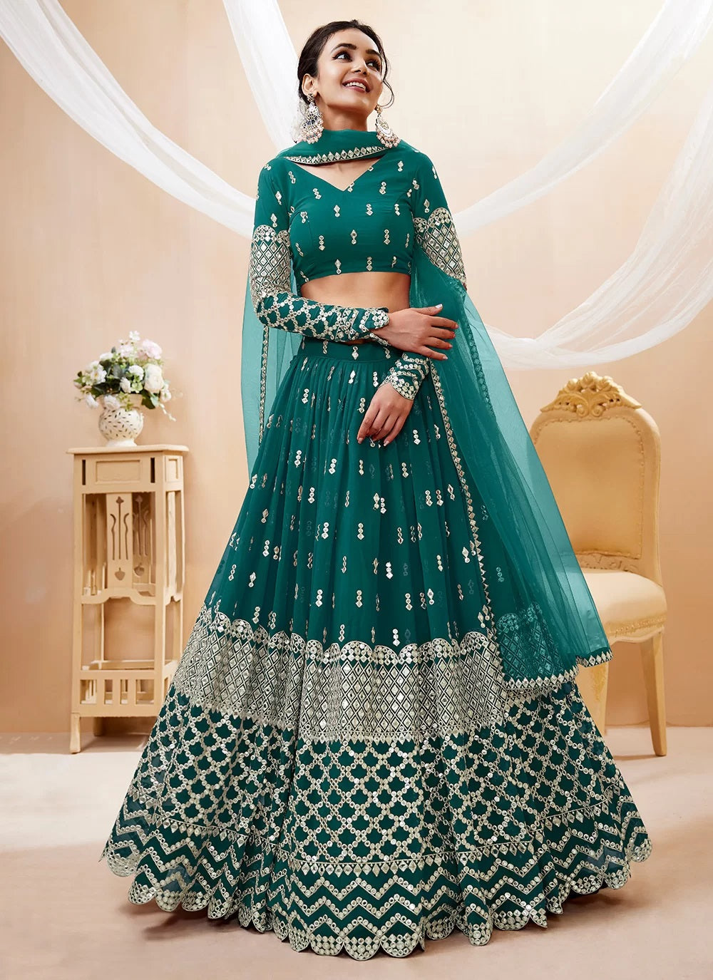 Teal blue georgette sequins zari embroidered party wear lehenga