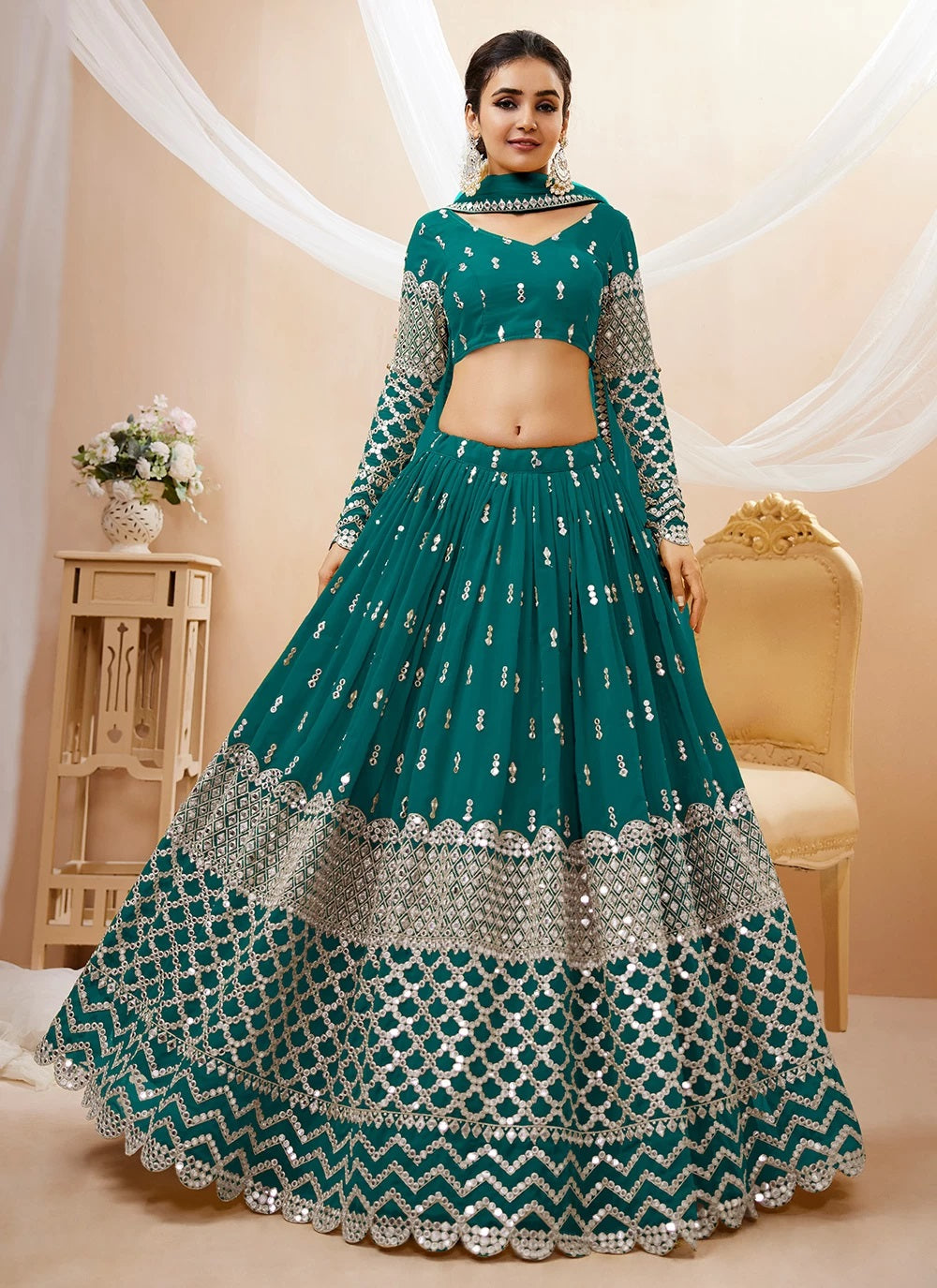 Teal blue georgette sequins zari embroidered party wear lehenga