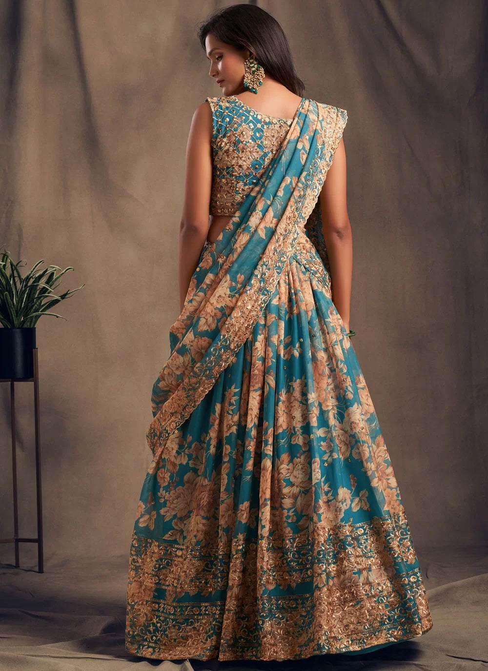 Teal blue zari embroidered organza based lehenga
