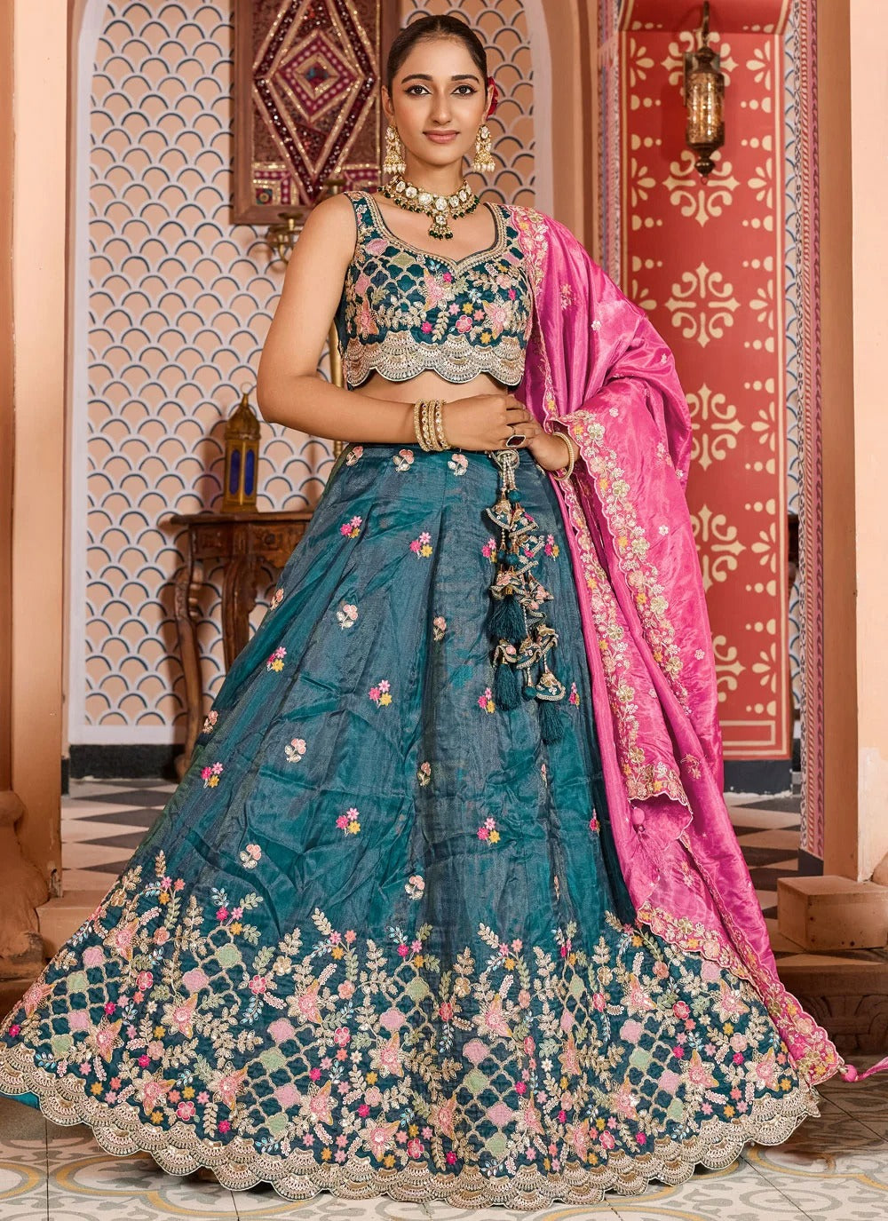 Teal tissue bridesmaid lehenga with sequins stone coding embroidery