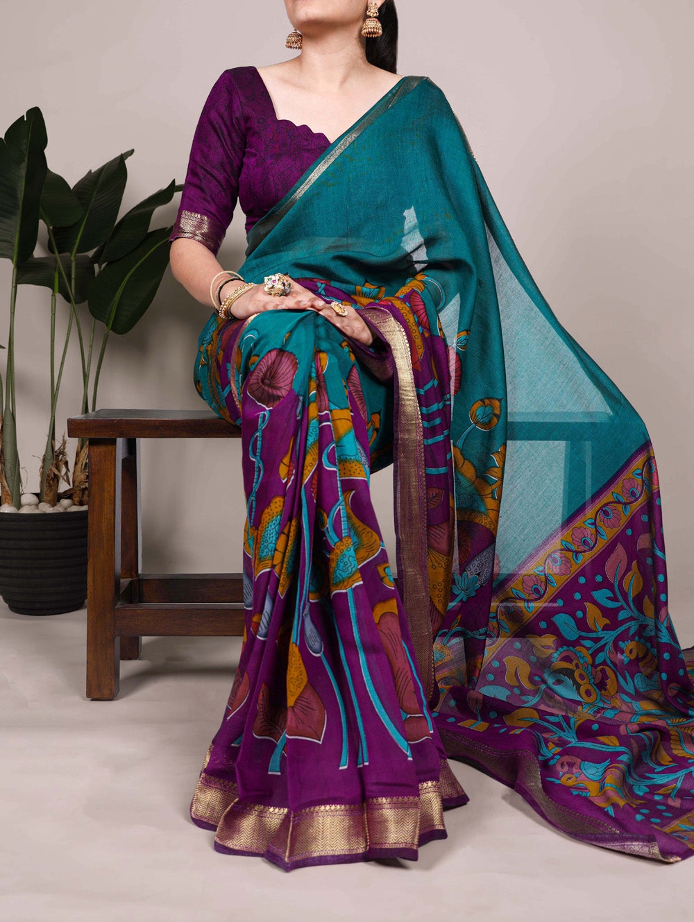 Teal floral printed viscose chanderi silk saree with zari weaving border