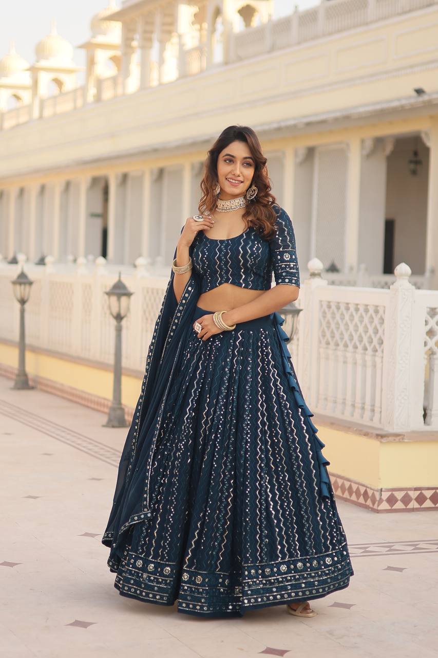 Teal Dazzling Faux Blooming Lehenga Choli with Sequins & Thread Embroidery