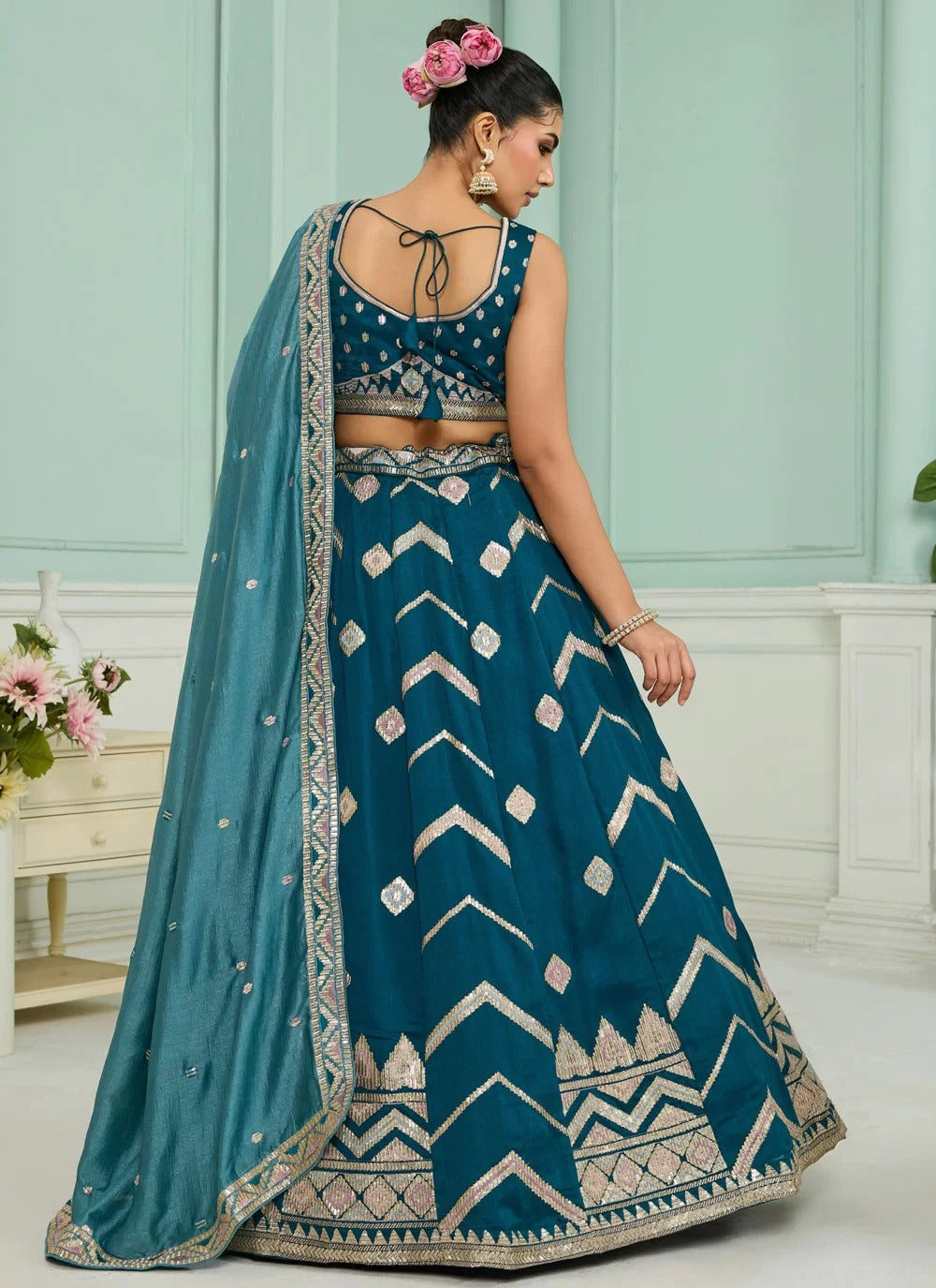 Teal silk bridesmaid wedding lehenga with heavy embroidery