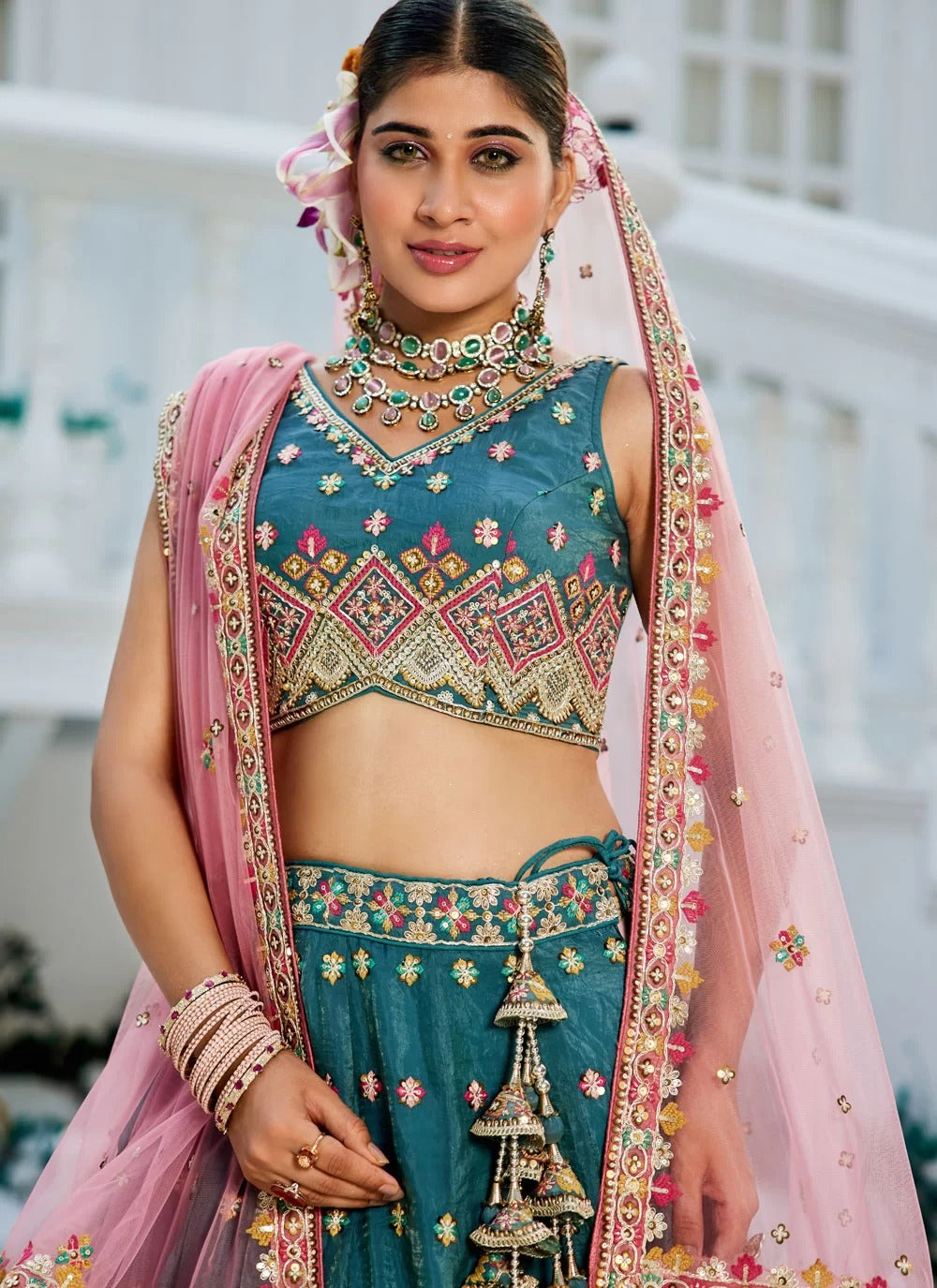 Elegant teal embroidered tissue bridal lehenga choli with sequins work for wedding