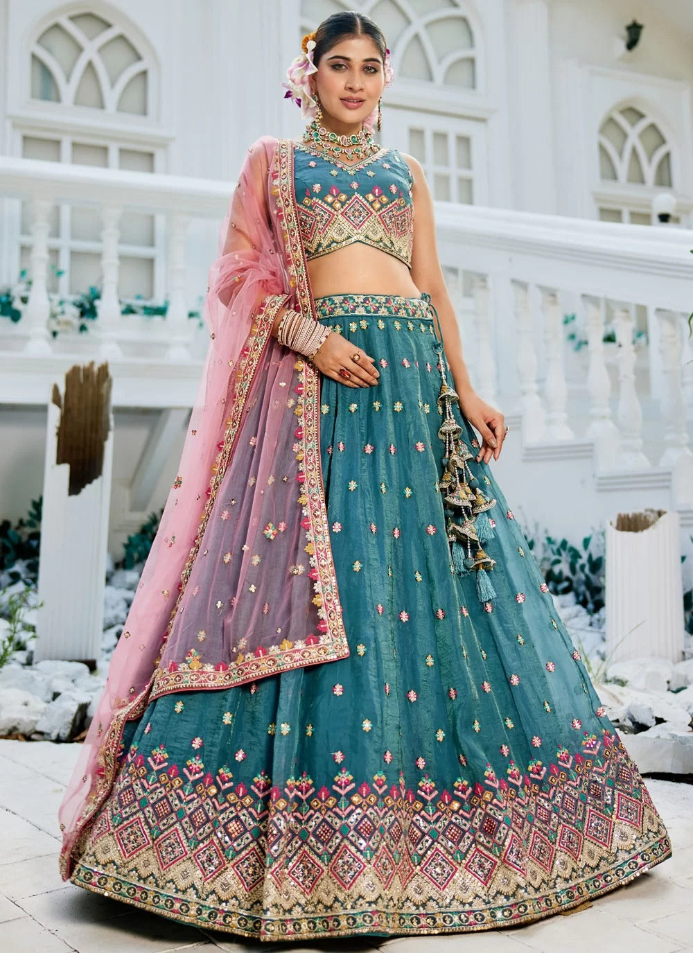 Elegant teal embroidered tissue bridal lehenga choli with sequins work for wedding