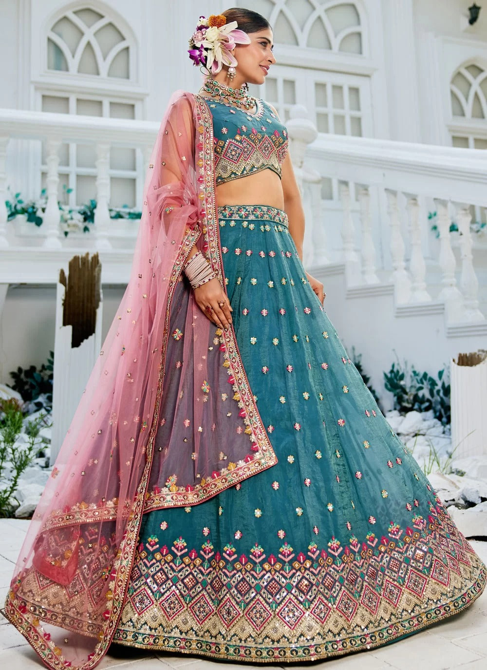 Elegant teal embroidered tissue bridal lehenga choli with sequins work for wedding