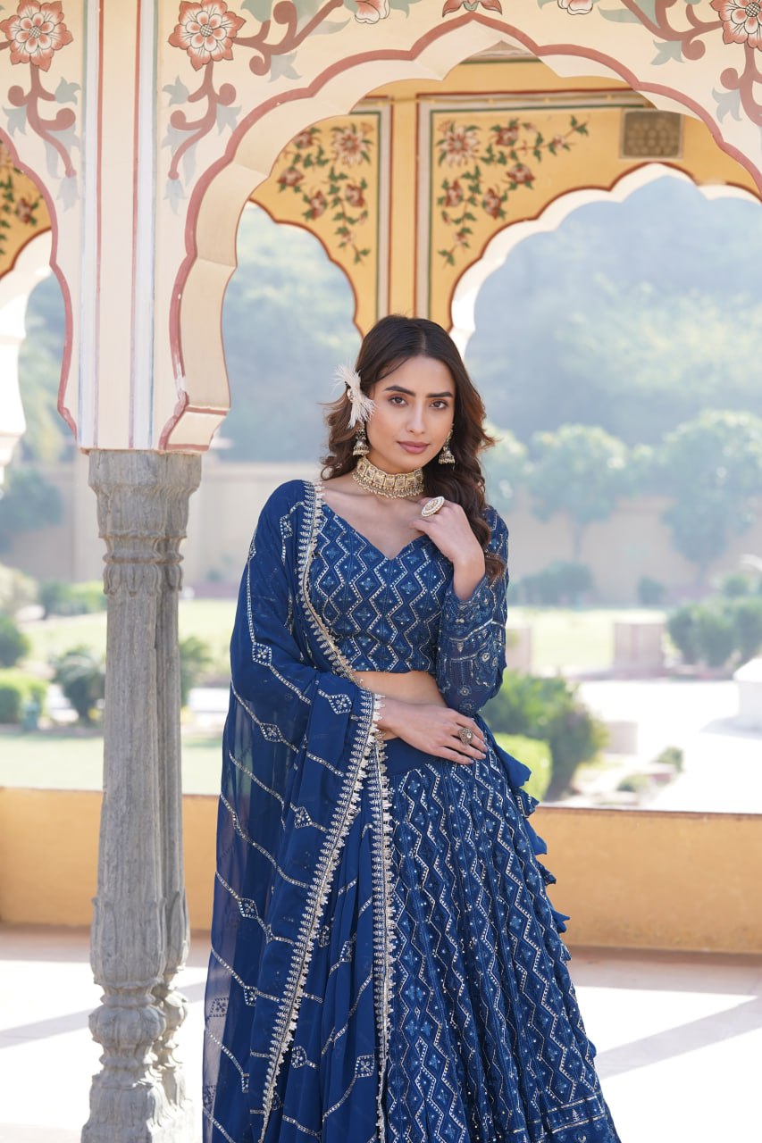 Shimmering Teal Faux Georgette Lehenga Choli with Sequins & Thread Work