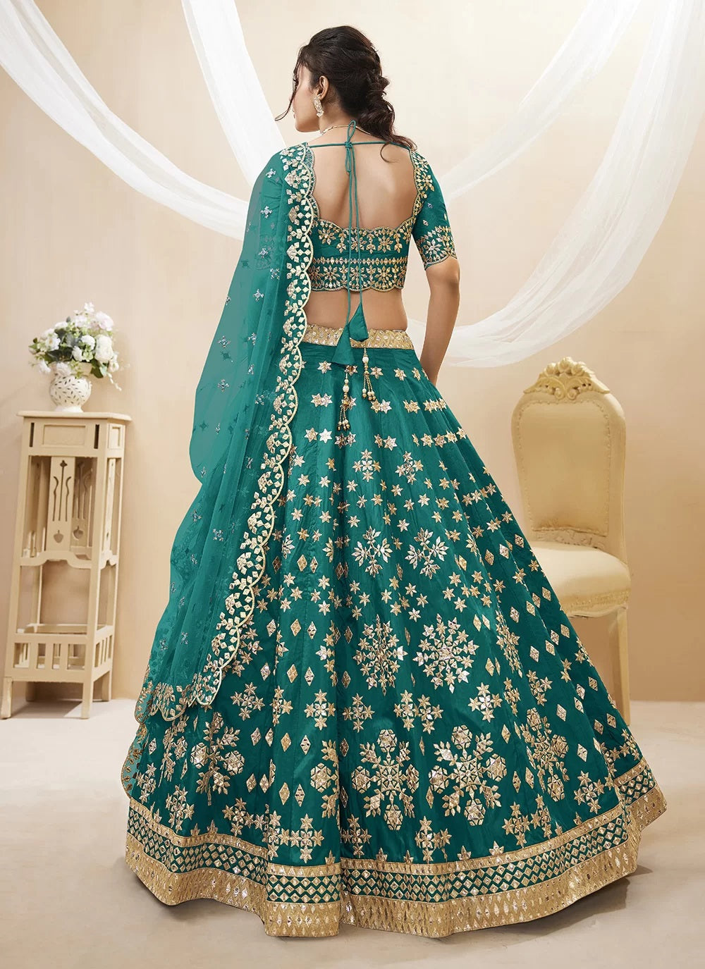 Teal green embroidered art silk designer lehenga