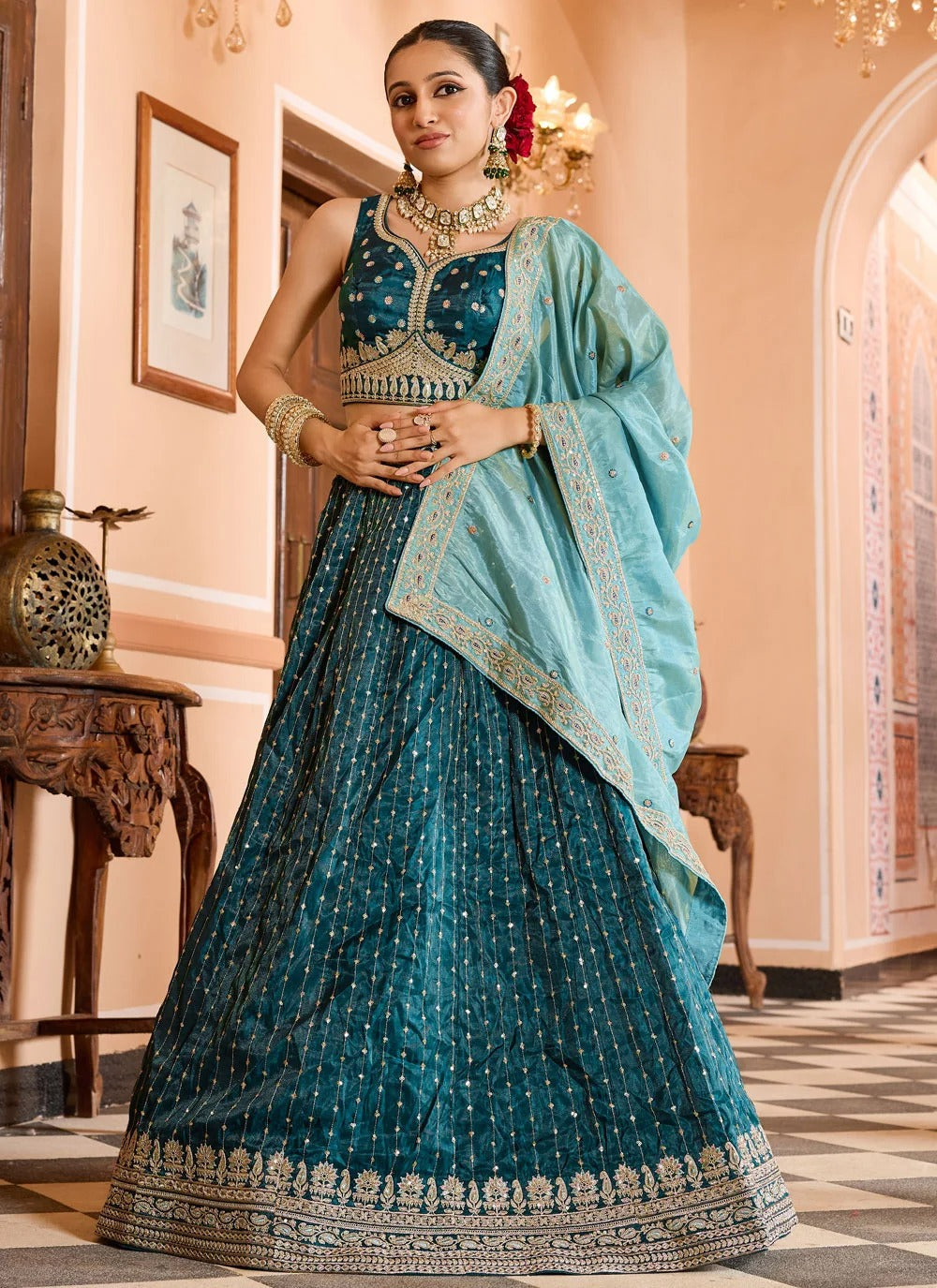 Luxury teal reception lehenga in tissue silk with zari sequins embroidery