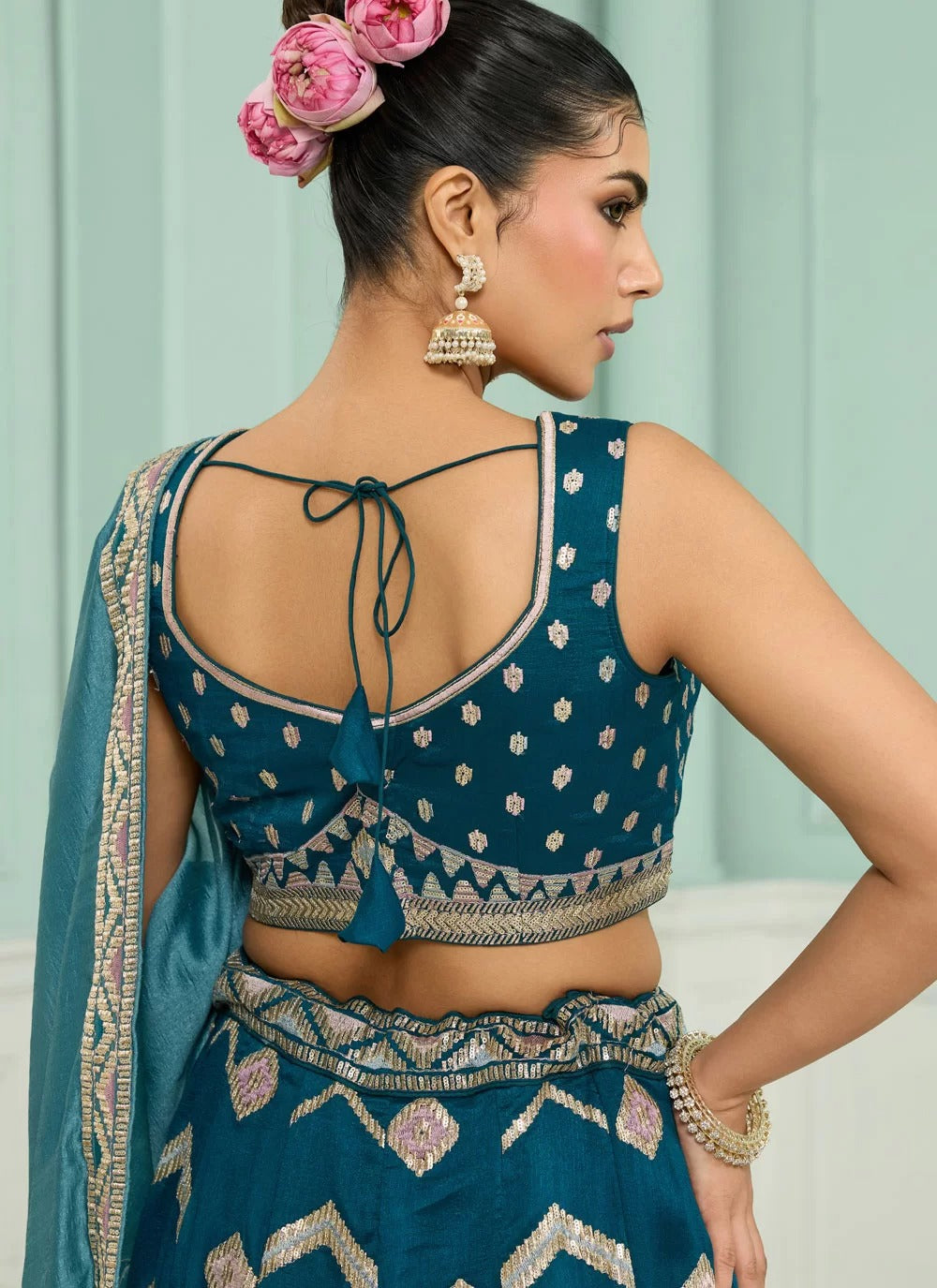 Teal silk bridesmaid wedding lehenga with heavy embroidery