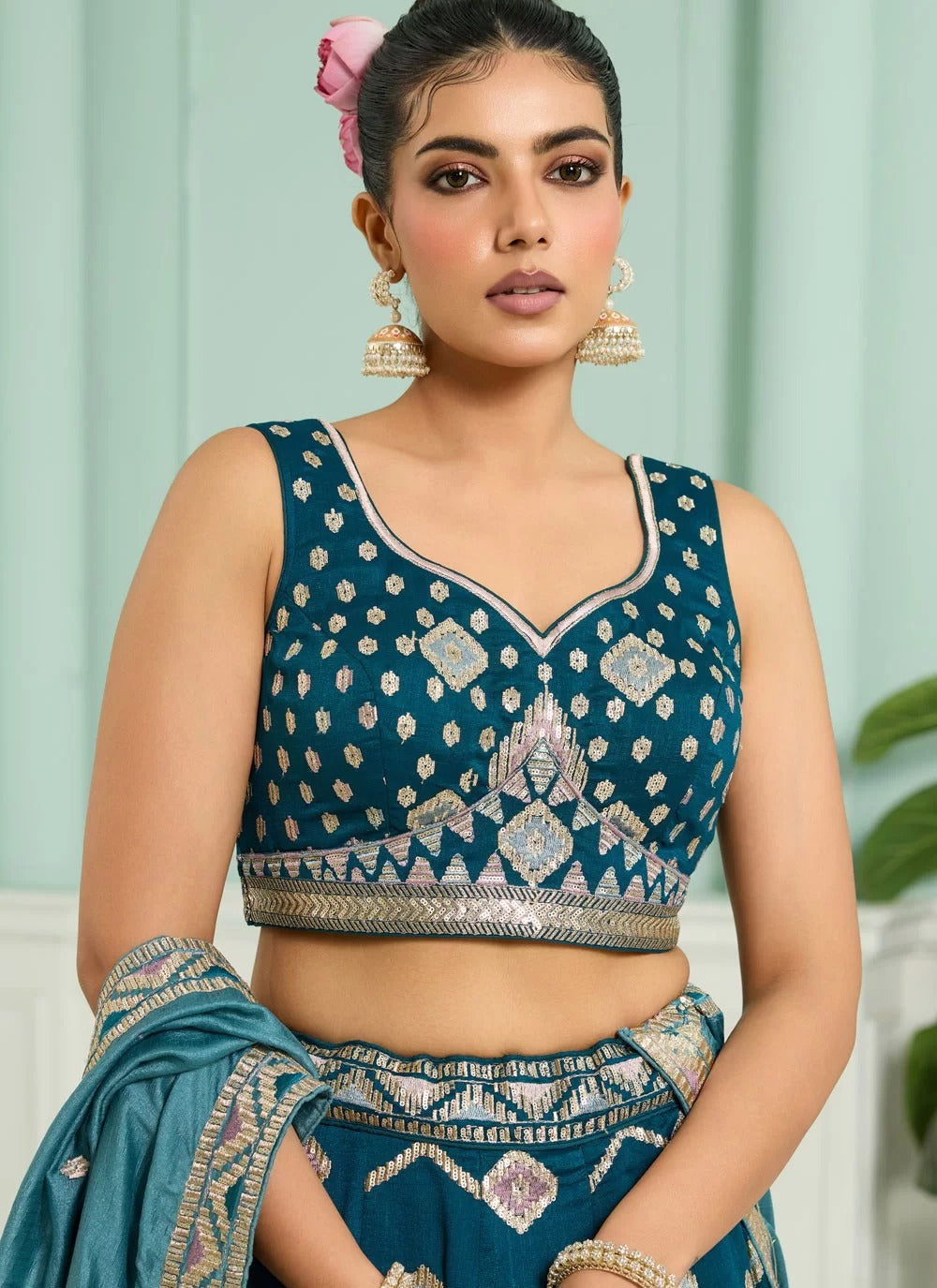 Teal silk bridesmaid wedding lehenga with heavy embroidery
