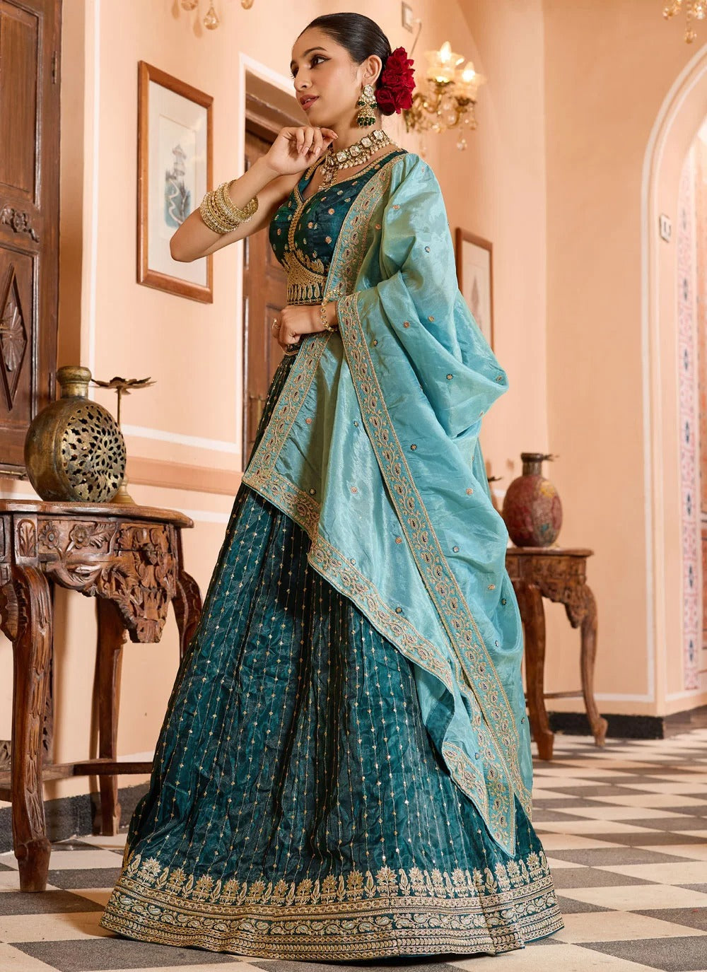 Luxury teal reception lehenga in tissue silk with zari sequins embroidery