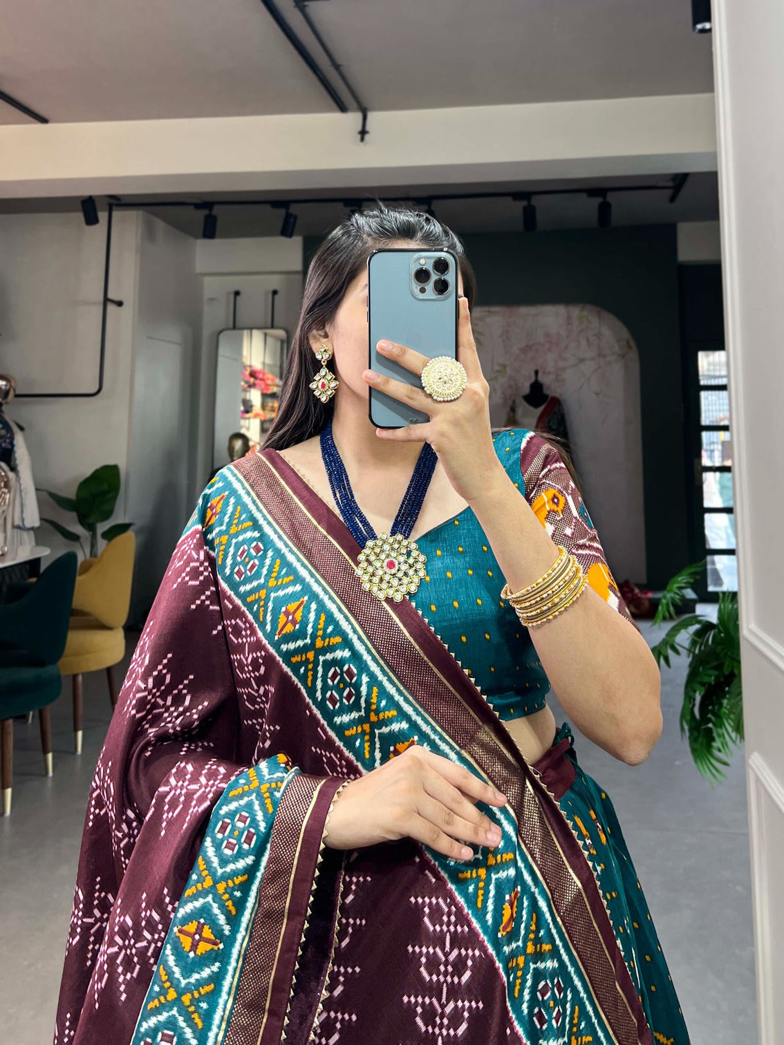 Teal Tussar Silk Lehenga Choli with Enchanting Ikat Patola Print and Foil Work