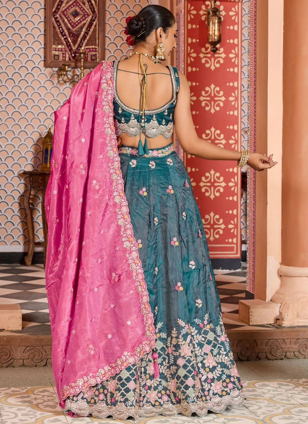 Teal tissue bridesmaid lehenga with sequins stone coding embroidery