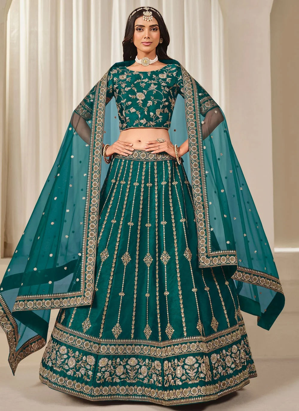 Elegant teal bridesmaid lehenga in art silk with embroidered net dupatta