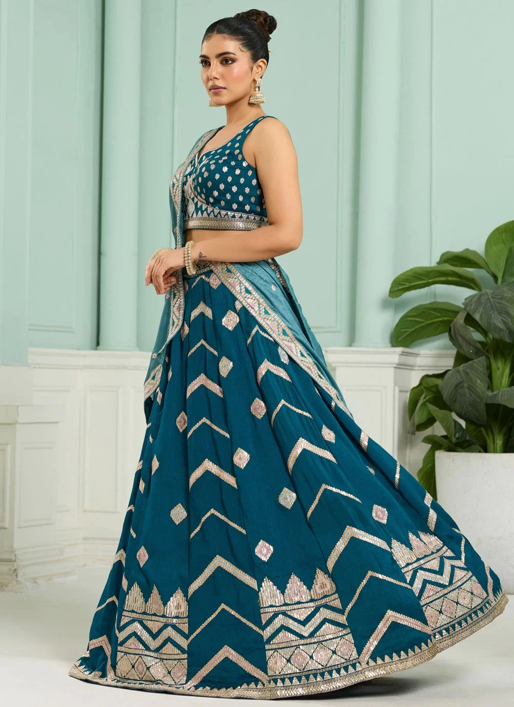 Teal silk bridesmaid wedding lehenga with heavy embroidery