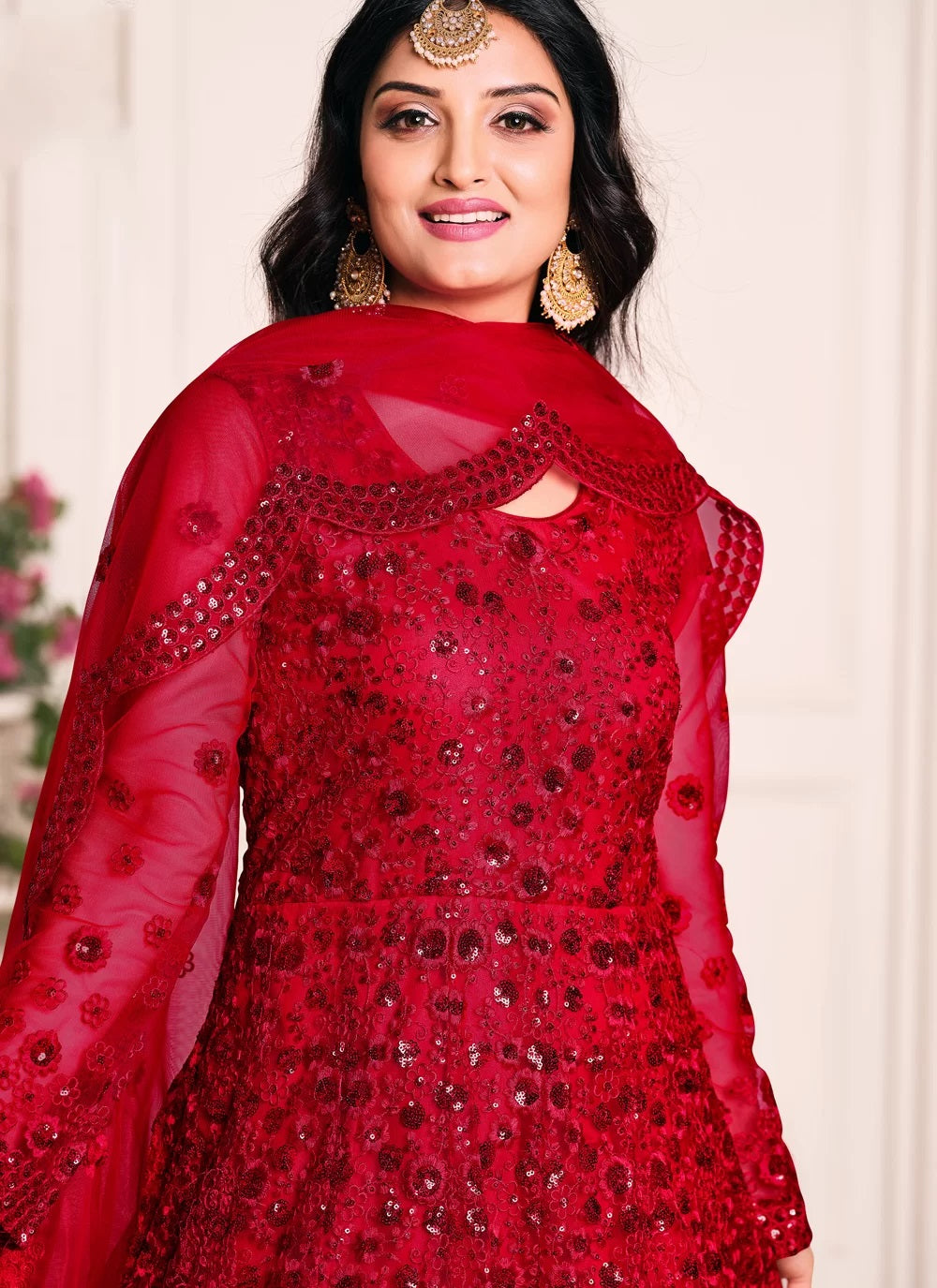 Thread embroidered net anarkali suit in red