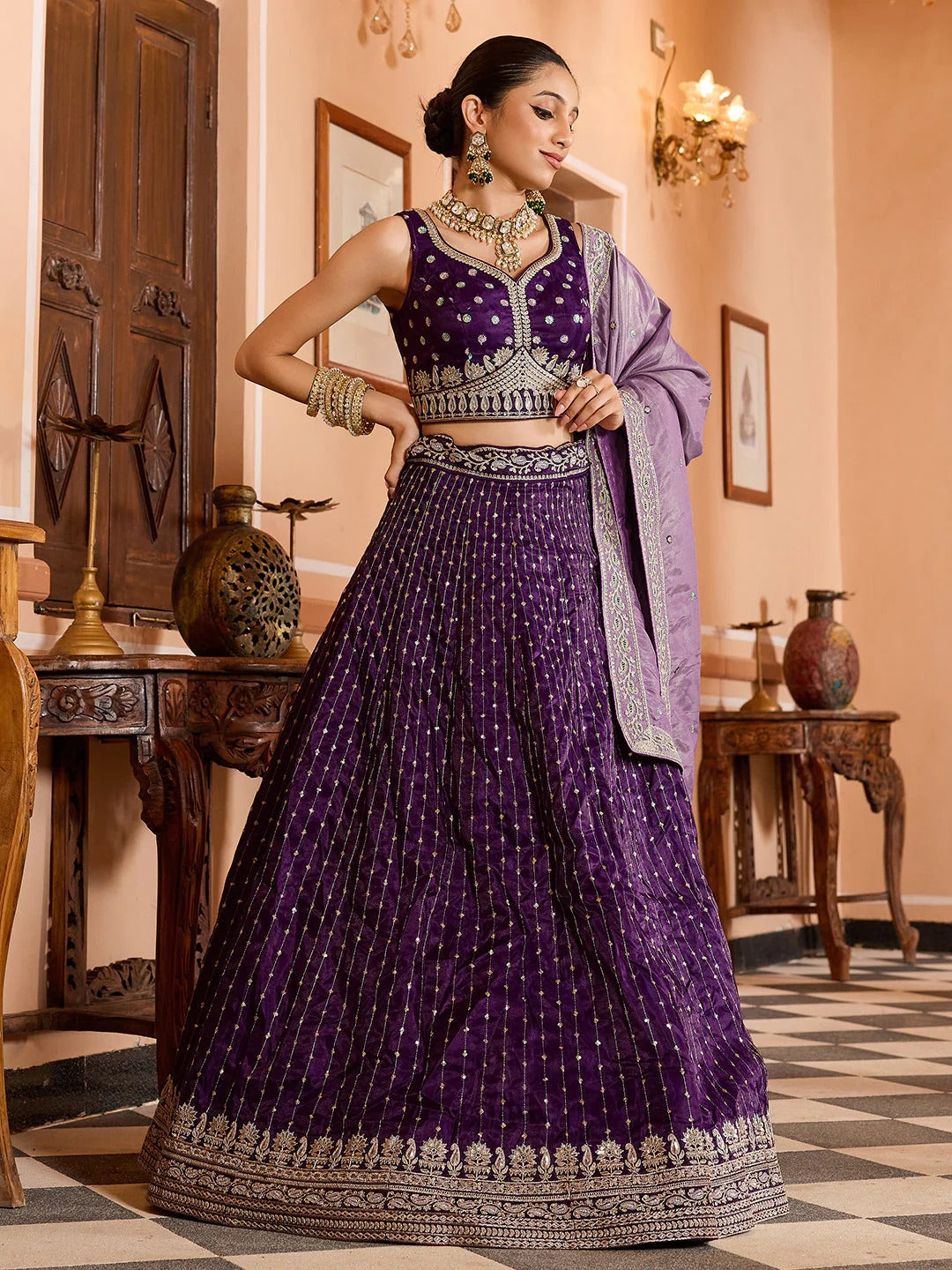 Royal purple engagement lehenga in tissue silk with zari sequins embroidery