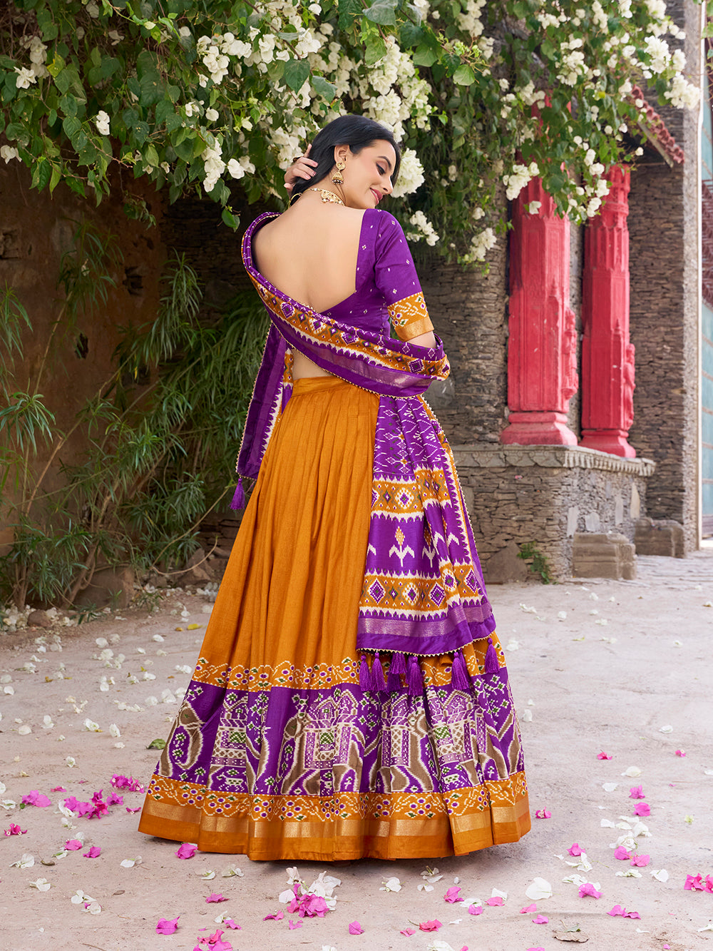Mustard tasar silk lehenga choli with patola print foil work elegance