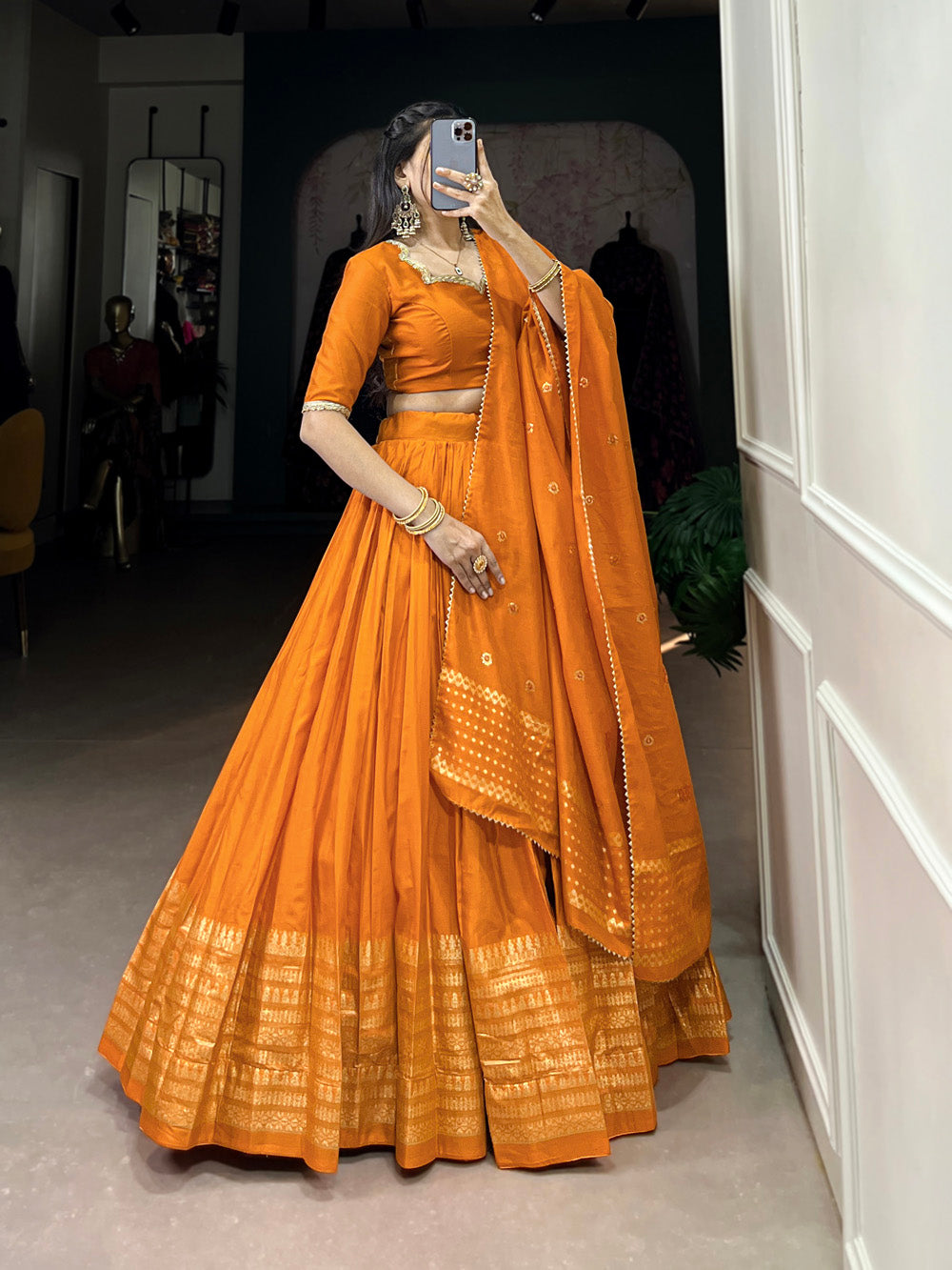 Vibrant orange chanderi silk lehenga choli with zari weaving matching dupatta