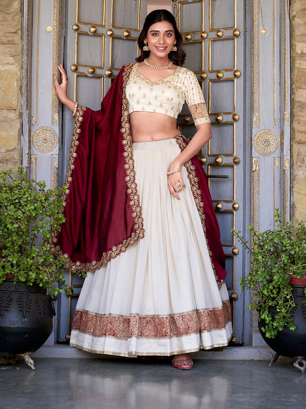 Off white vichitra silk zari weaving lehenga choli with sequin belt dupatta