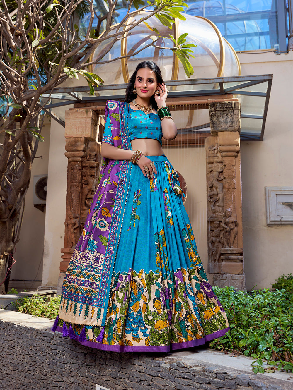 Firozi tussar silk lehenga choli with kalamkari print foil work elegance