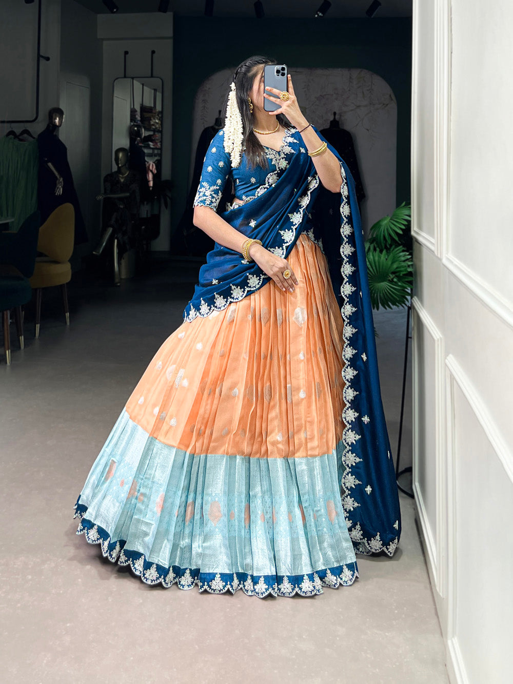 Orange zari kota embroidered lehenga choli with blue vichitra silk dupatta