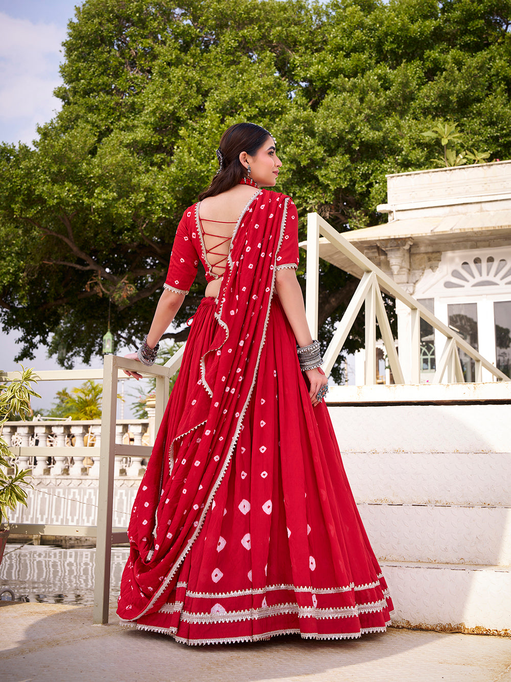 Red chanderi bandhej print chaniya choli with lace detailing 6 meter flair