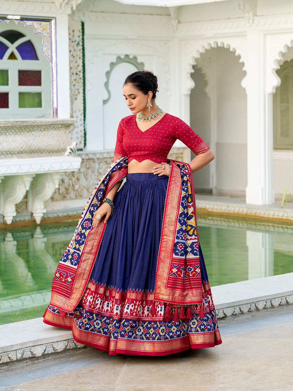 Navy blue tasar silk lehenga choli with ikkat patola print foil work