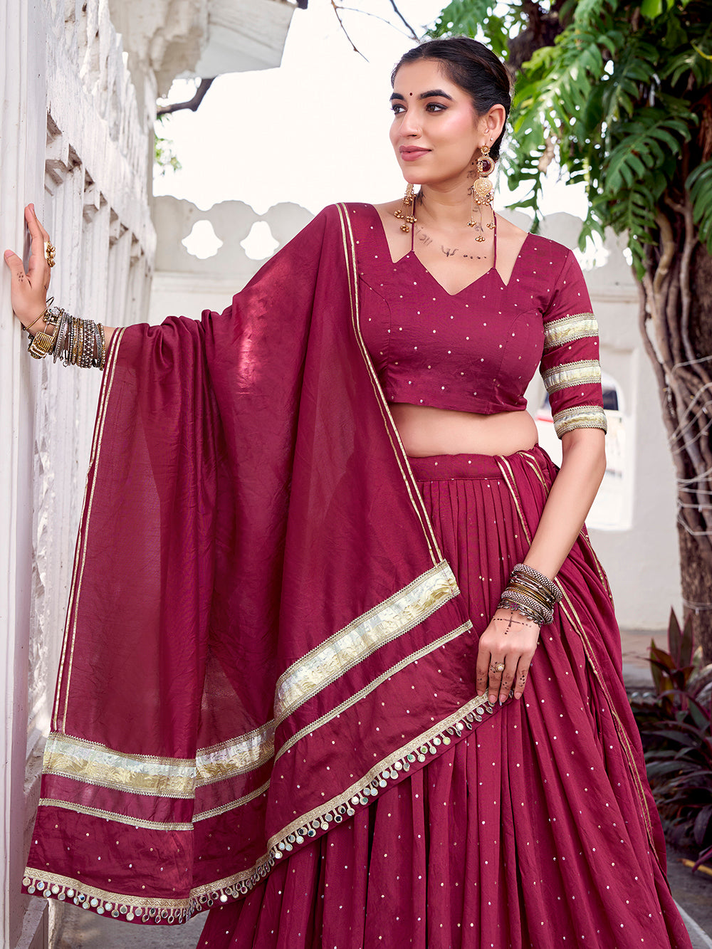Maroon chanderi zari weaving lehenga choli with embossed lace dupatta