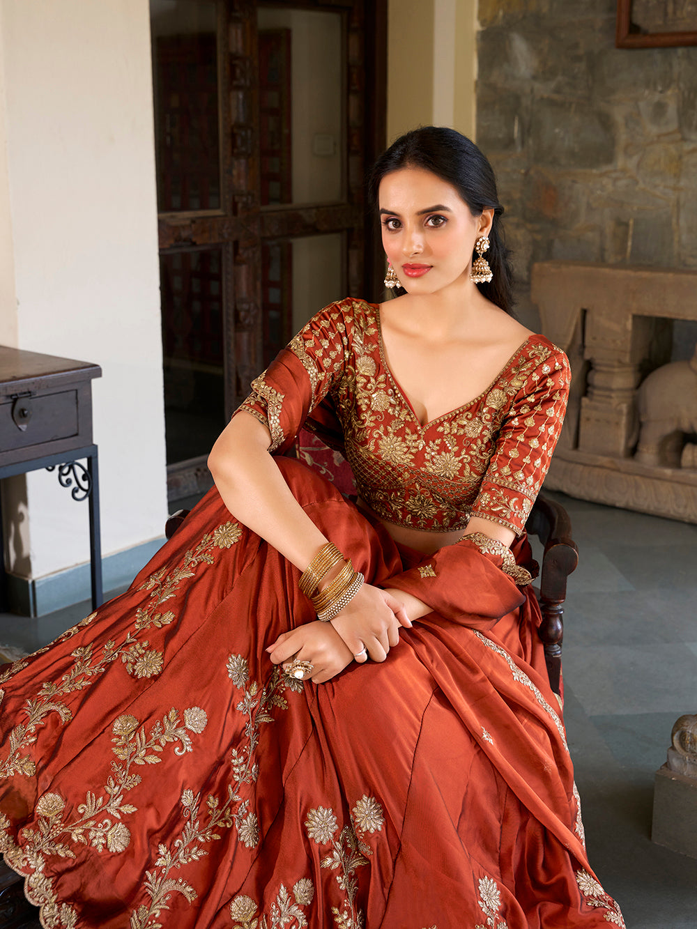 Rust orange color sequins and thread embroidery work rangoli silk lehenga choli