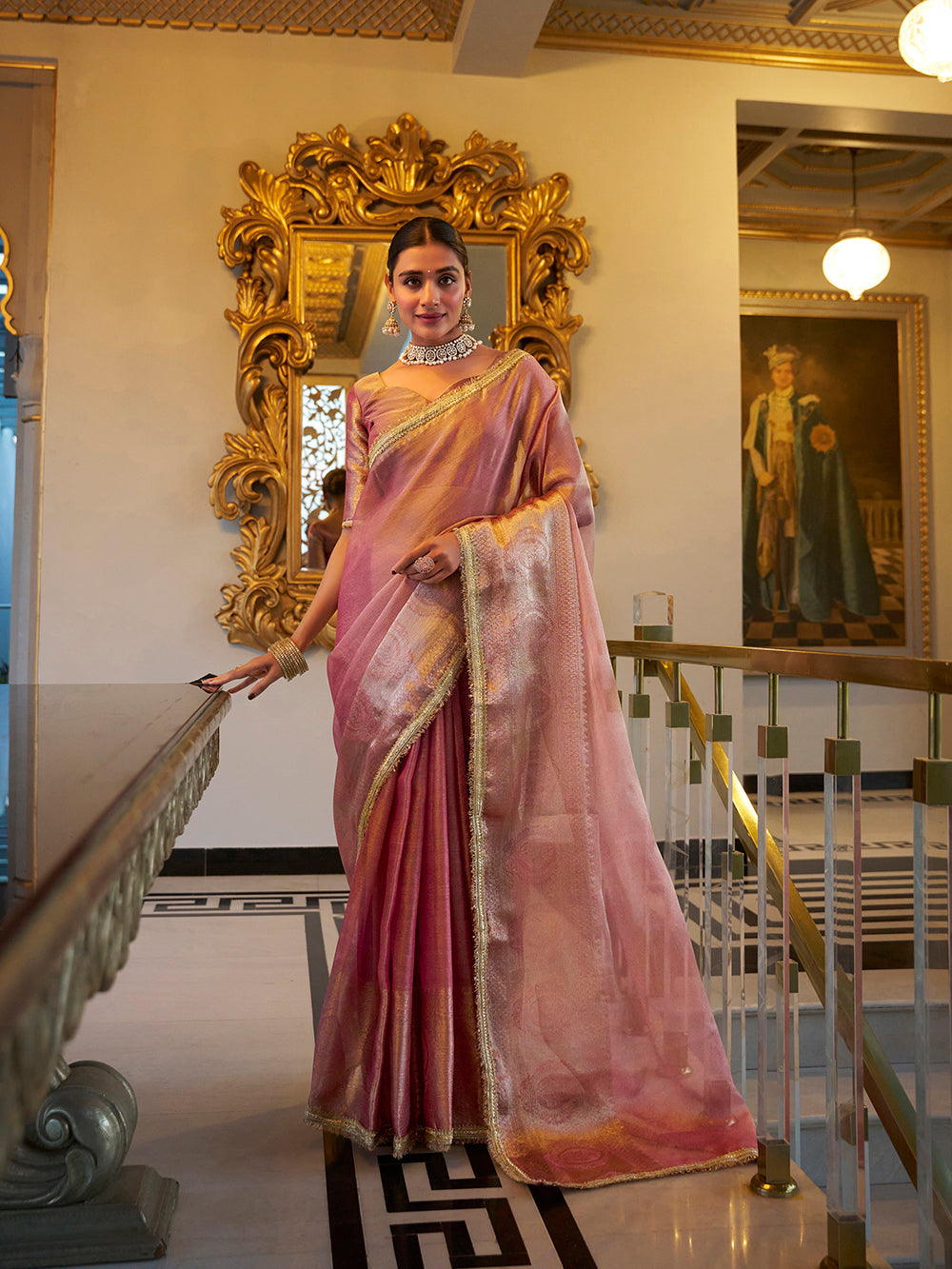 Light pink zari weaving tissue shimmer saree with sequins lace border